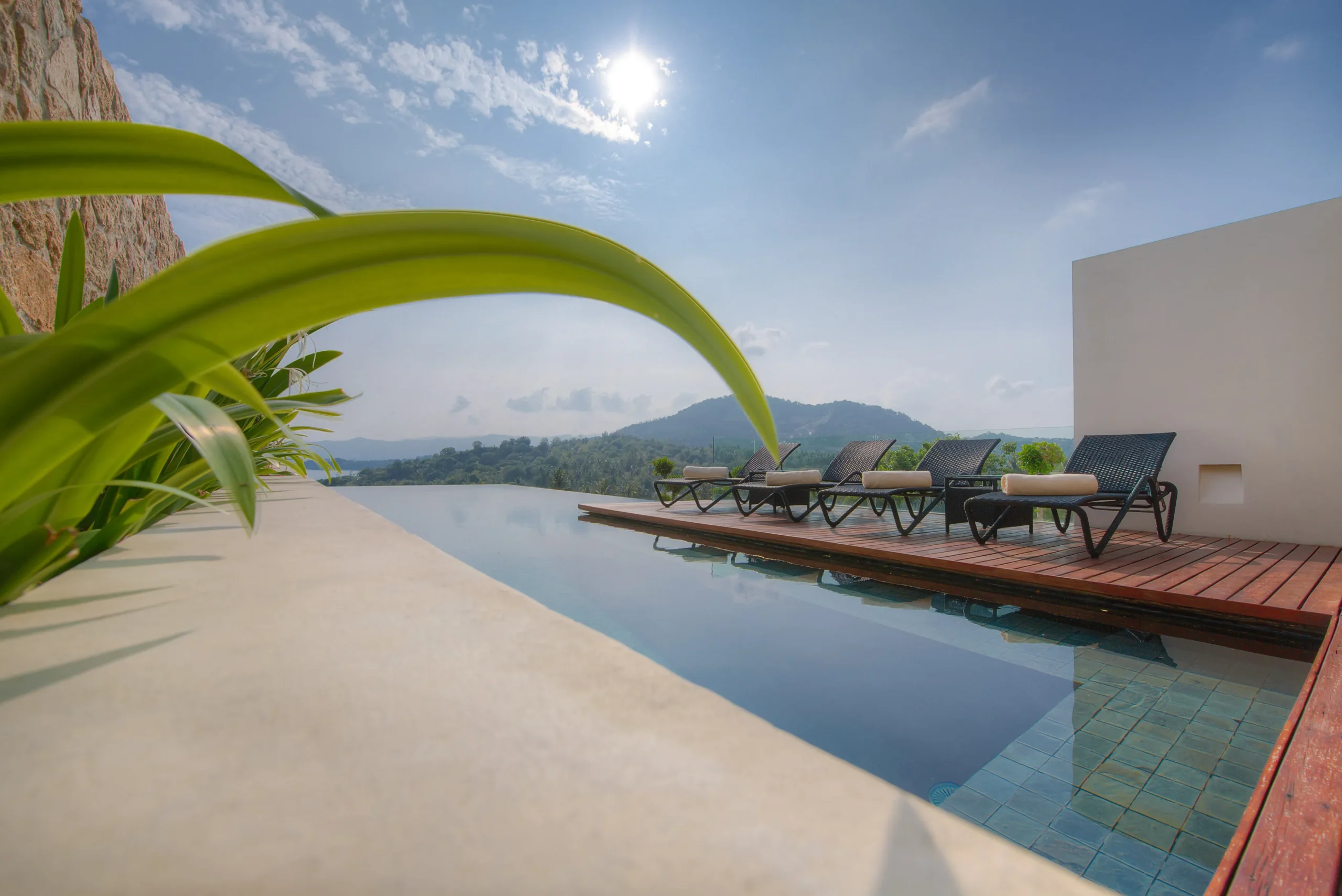 Teak pool deck with infinity pool and coastal view, Chaweng Noi, Koh Samui